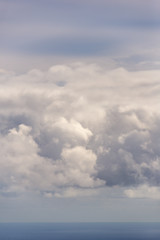 Naklejka na ściany i meble clouds above ocean