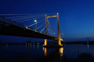 Bridge over Columbia river at night with reflections