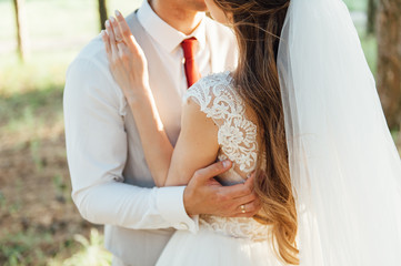Fototapeta premium Young wedding couple outdoor. Groom and bride together