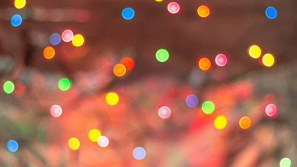colored bokeh lights on a shiny background