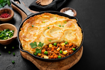 Shepherd's pie, traditional British dish with minced meat, vegetables and mashed potatoes.