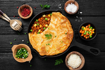 Shepherd's pie, traditional British dish with minced meat, vegetables and mashed potatoes.