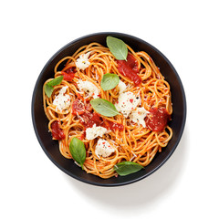 Spaghetti with  tomato sauce, parmesan and mozzarella cheese decorated with basil.isolated on white background