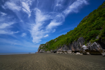 sam roi yod beach and green tree on mountain and blue sky