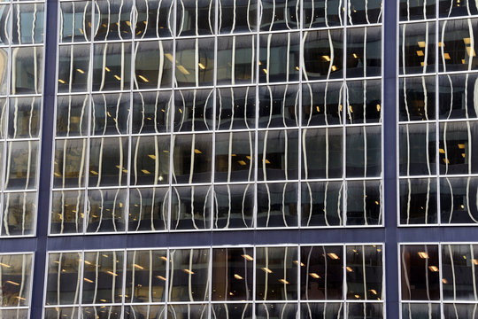 detail of the facade of a modern glass and steel building