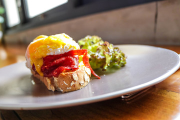 Breakfast menu with delicious eggs and vegetables