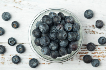 A glass bowl with blueberry	