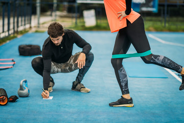 Young Woman Exercising with Resistance Band