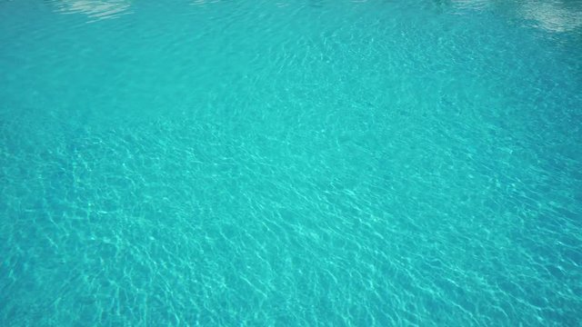 texture of blue water in the pool