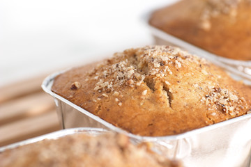 A trio of home made bio cakes against a white background