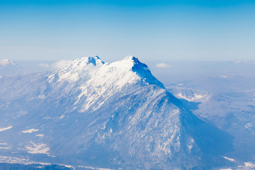 The view from the summit of Untersberg mountain in Austria towards two mountains Zwiesel in Bavaria, Germany and Staufen in Austria.  Untersberg straddles the German and Austrian border.