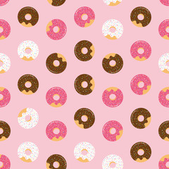 Pink seamless pattern with glazed donuts