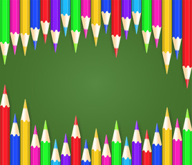 Funny children s background with colorful pencils. Color pencils in rainbow style on a school blackboard. Concept for children and back to school.
