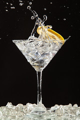 Glass, Lemon And Splash Of Water