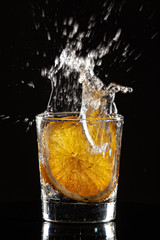 Glass, Orange, Ice And Splashes