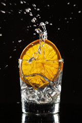 Glass, Orange, Ice And Splashes