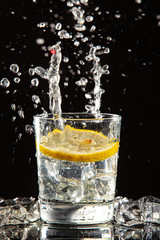 Glass Of Water, Ice And Lemon