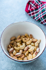 Cashew and Siirt Pistachios in Ceramic Bowl. Healthy Organic Snacks.