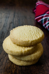 Butter Shortbread Cookies on Dark Wooden Surface / Short Bread Biscuits.