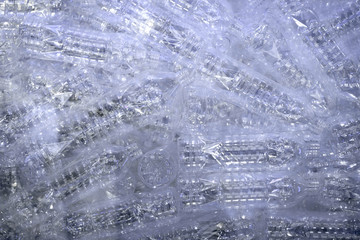 Clear plastic bottles were put together. Which is a bottle by plastic recycling