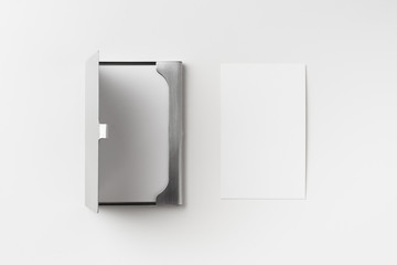 top view of business card with case on white