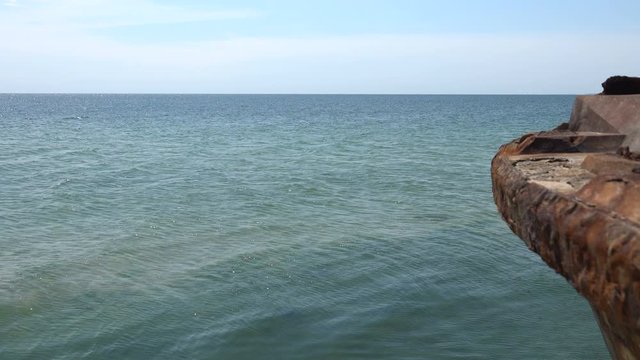 Old sunken rusty barge on the Black Sea