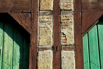 Historic Timber Frame Detail with Green Doors