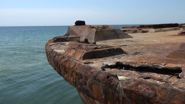 Old sunken rusty barge on the Black Sea