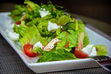 Mediterranean salad cherry tomatoes and goat cheese