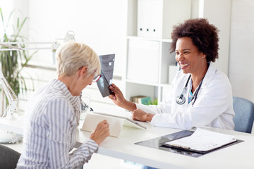 Mature woman at the doctor office come to consult about her health