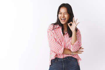 Wow awesome you go girl. Portrait of amused and impressed upbeat good-looking stylish asian woman...