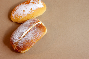 Cream Butter Butter On Brown Paper Background.