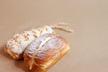 Cream Butter Butter On Brown Paper Background.