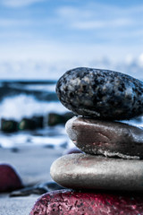 Fototapeta na wymiar zen stones on a sea background