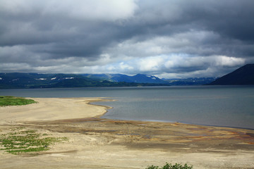 Beatiful lake with sandy beach on Kamchatka