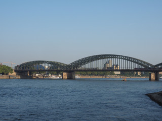 Fototapeta na wymiar Hohenzollernbruecke (Hohenzollern Bridge) over river Rhine in Ko