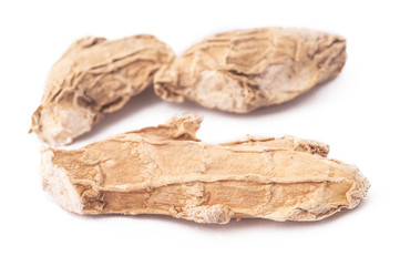 DRY GINGER MACRO SHOT ON WHITE BACKGROUND 