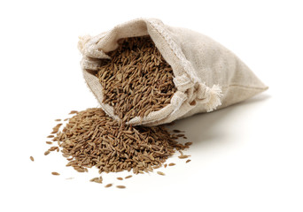 cumin seeds on white background