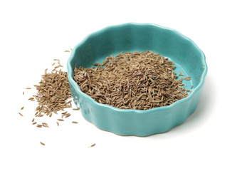cumin seeds on white background