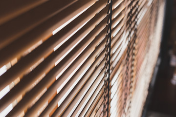 Selective focus Pattern of bamboo curtain  texture background with sunlight