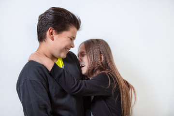 little girl and boy laughing