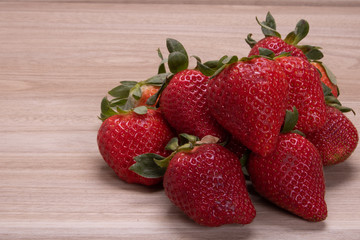 strawberries set on wooden background