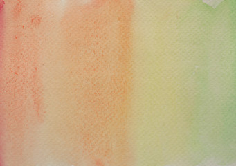 Watercolor stroke and spray on white paper , Abstract background by hand drawn green with orange and yellow  liquid drip