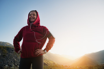 Adult woman resting after running. Sports and recreation.