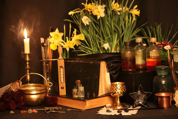 Witchcraft Peacock feathers and candle background.