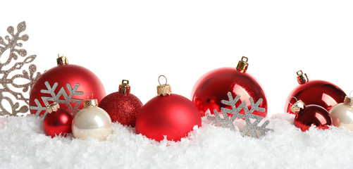 Christmas tree decoration on artificial snow against white background