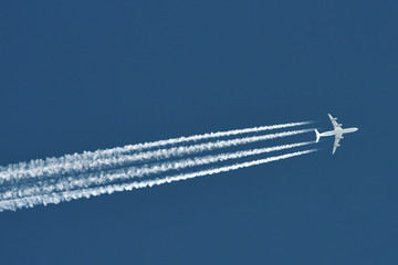 Airplane In Blue Sky