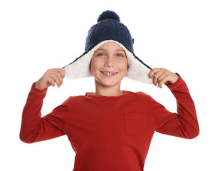 Cute little boy in hat on white background. Winter season