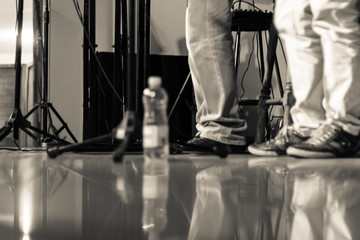 Musicians feet in a performance on the stage