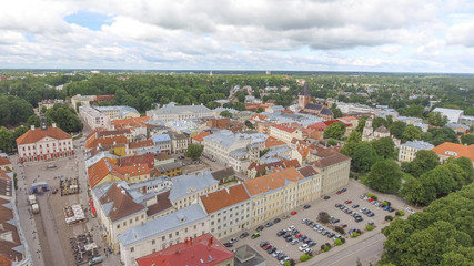 Obraz premium Aerial view of Tartu skyline on a cloudy summer day